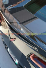 Black C7 Corvette Stingray with Oracal carbon flash racing stripes