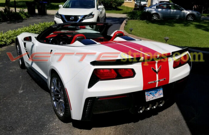 White C7 Corvette grand sport convertible with adrenaline red GM dual racing stripes