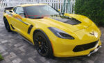 Yellow C7 Corvette Z06 with 3M 1080 gloss carbon flash supercharged Yenko style side stripes