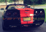 Black C6 Corvette convertible with red GM full racing 2 and rear jake option