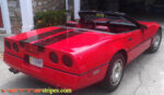 Red C4 Corvette convertible with black CE1 stripe