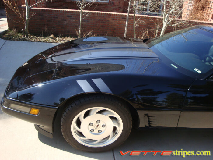 Black C4 Corvette with metallic dark charcoal CE stripes