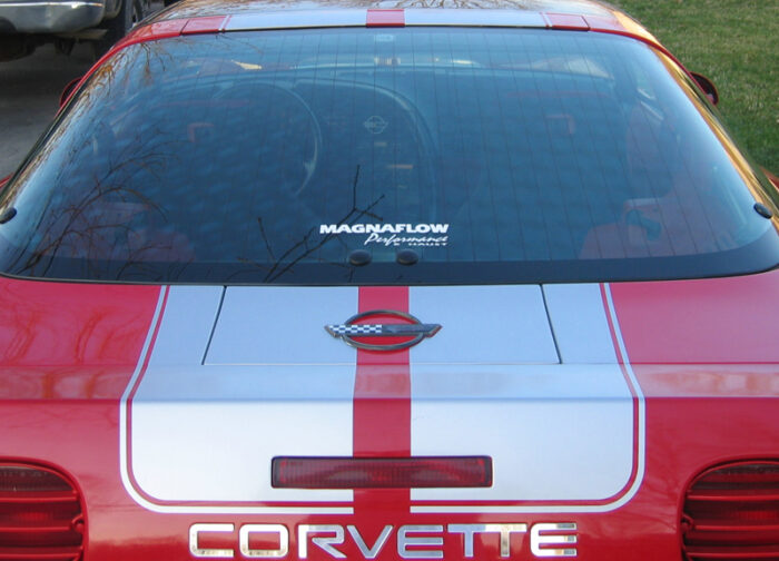 Red C4 Corvette coupe with metallic silver CE1 stripe