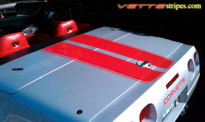 Silver C4 Corvette convertible with red CE stripes