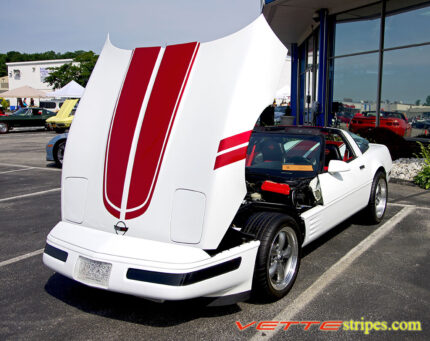 White C4 Corvette with metallic red CE stripe