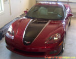Mag red C6 Corvette with metallic black and silver ME stripe