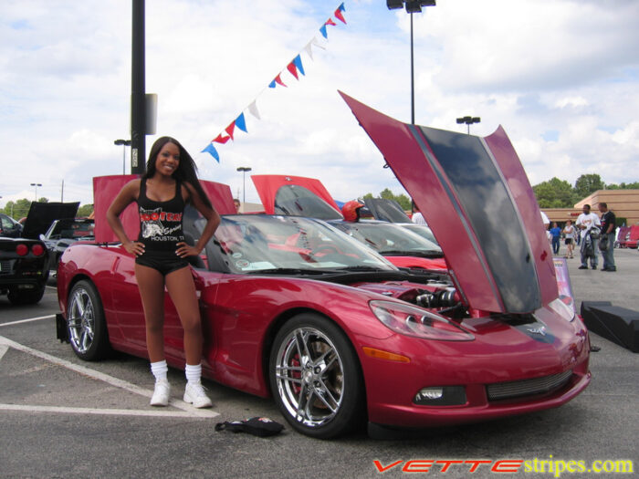 Mag red C6 Corvette with metallic black and metallic dark charcoal ME stripe