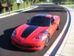Red C6 Corvette Z06 Grand Sport with black and silver ME stripe and custom texts