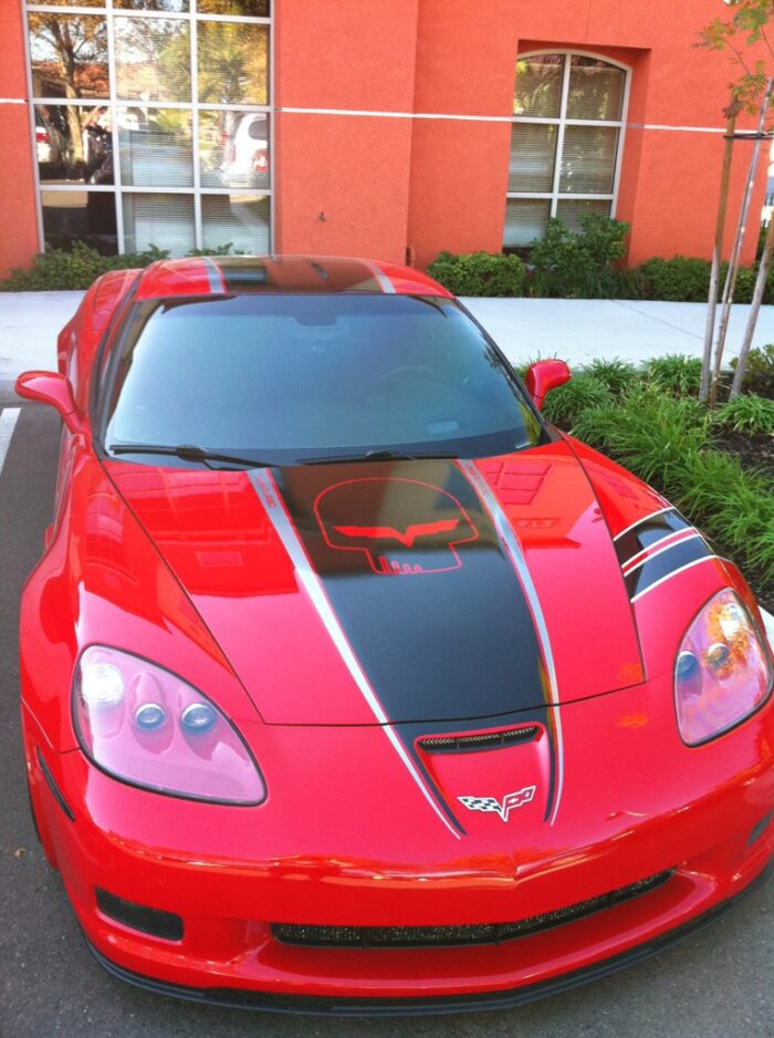 Red C6 Corvette Z06 Grand Sport with black and silver ME stripe and optional jake skull
