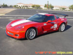 Red C6 Corvette Z06 Grand Sport with white and matte black ME stripe