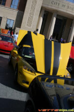 Yellow C6 Corvette Z06 Grand Sport with black ME1 stripe