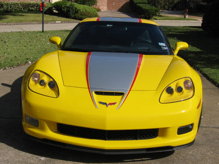 Yellow C6 Corvette Z06 Grand Sport with silver and red ME stripe