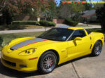 Yellow C6 Corvette Z06 Grand Sport with silver and red ME stripe