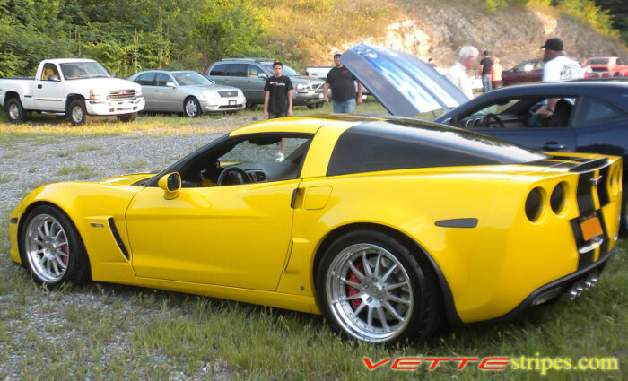 yellow C6 Corvette Z06 with black racing 2 stripe
