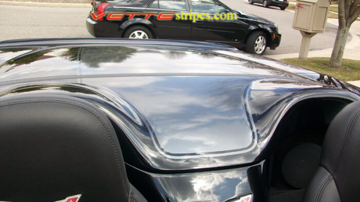C6 Corvette black convertible with metallic dark charcoal stripe
