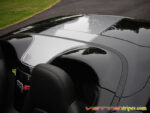 C6 Corvette black convertible with metallic silver stripe