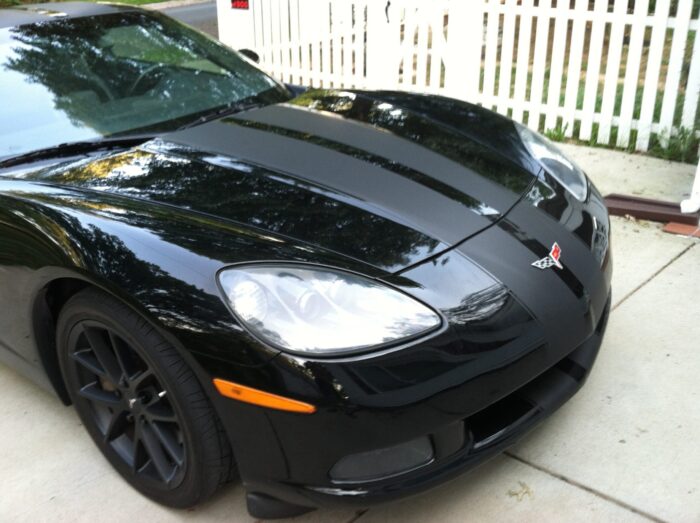 Black C6 Corvette with matte black racing stripe 2