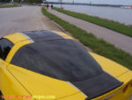 Yellow C6 Corvette coupe with black and silver ME stripe
