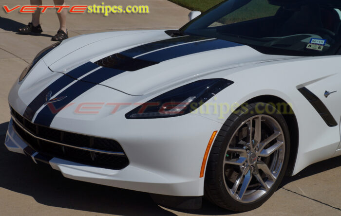 White C7 corvette convertible with dark blue GM full racing stripe to match dark blue top