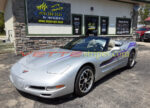 Silver C5 Corvette convertible with side stripes graphic