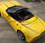 Velocity yellow C6 Corvette with gloss black hood and rear spears