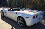 White C6 Corvette Grand Sport convertible with red Hero stripes