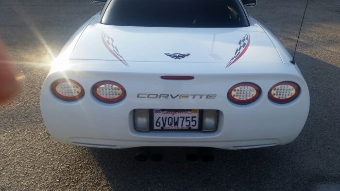 White C5 Corvette Z06 with black and red checker super hood stripes
