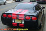 C5 Corvette black Z06 with red rally racing stripe