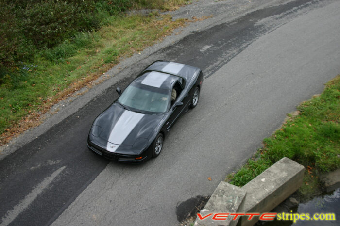 Black C5 Corvette with gunmetal classic 1 stripes