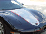 Black C5 Corvette coupe with silver and red ME stripe