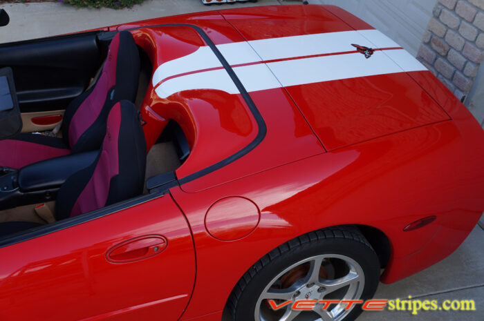Red C5 Corvette convertible with white full body racing stripe style 3