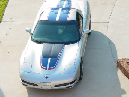 Silver C5 Corvette Z06 with grand blue and red MCM hood stripe