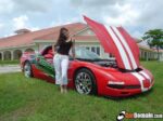 C5 Corvette torch red coupe with white racing stripe