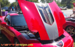 Torch red C5 Corvette with black and silver GT1 stripe and optional black carbon fiber jake skull insert