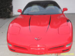Torch red C5 Corvette with black hood spear stripe