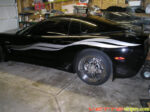 Black C5 corvette coupe with silver and pewter side stripes graphic
