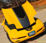 Yellow C5 Corvette with black and dark charcoal GT1 stripe