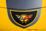 Yellow C5 Corvette with black and gunmetal GT1 stripe