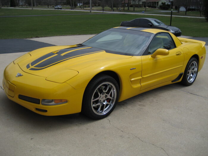 Yellow C5 Corvette with metallic black MCM hood style 2 stripe