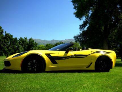 Yellow C7 Corvette Z06 with 3M 1080 carbon flash side stripe graphic