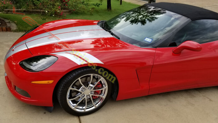 Red C6 Corvette convertible with metallic silver grand sport fender hash marks stripes