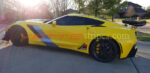 2019 yellow C7 Corvette ZR1 with C7R side stripes in 3M 1080 gloss blade silver