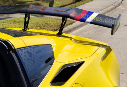 Yellow C7 Corvette ZR1 spoiler stripes in silver blue red