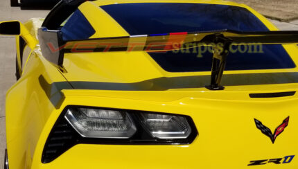Yellow C7 Corvette ZR1 spoiler stripes in silver blue red