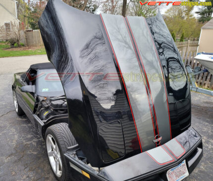 Black C4 Corvette convertible with AE stripes in shark gray and red