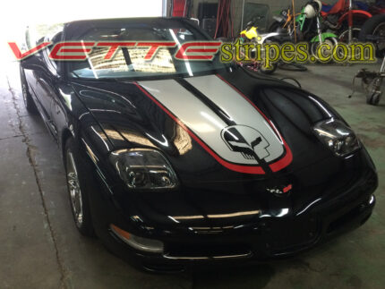 Black C5 Corvette with silver and red CE optional jake skull cutout