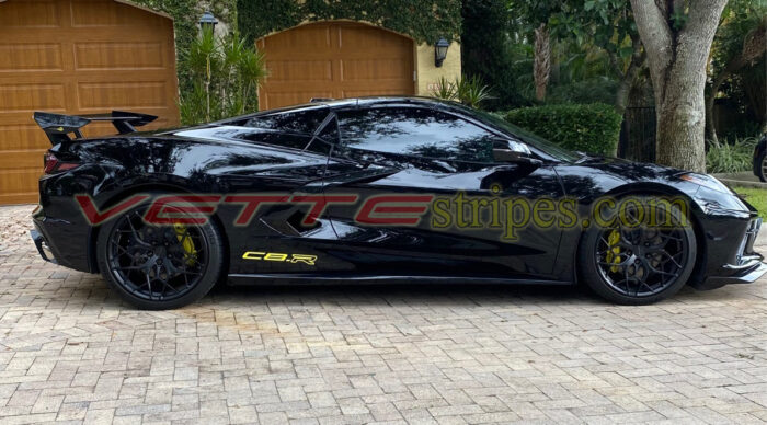 Black C8 Corvette with accelerate yellow C8 R hollow