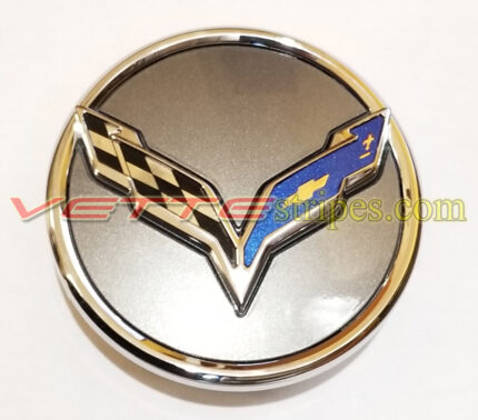 C7 Corvette wheel cap emblem overlay in laguna blue with bowtie cutout