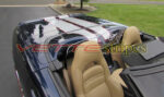 Navy blue C5 Corvette convertible with blade silver and red CE2 stripes