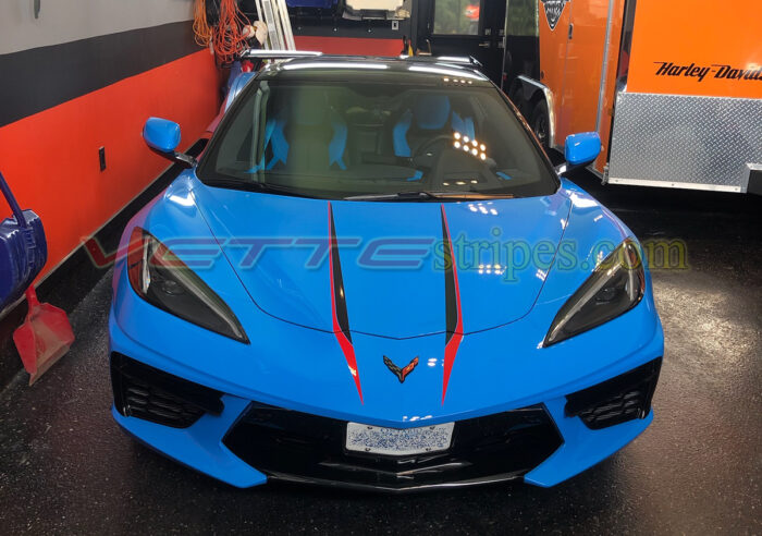 Rapid blue C8 Corvette with Adrenaline red and carbon flash hood spear stinger stripes